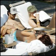 Lindsay Lohann sunbathing